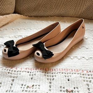 Melissa women’s pink shoe slight wedge size 9